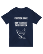 "Tan ‘Chicken Game Nerd’ t-shirt with cartoon chicken rolling D20 dice, styled with hay bale and gaming manuals for farm-to-table RPG aesthetic"
Poultry-Powered SEO Tactics
Dual-Audience Keywords:
"Gamer chicken shirt" (niche but viral potential)
"Farm RPG humor" (unique long-tail)
"D&D pun tee" (community appeal)
Visual Storytelling:
Hay bale prop reinforces farm theme
Gaming manuals show authentic nerd cred
Quality & Comfort:
"100% cotton" for broad appeal
"Vintage wash" adds character
Conversi