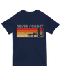 "Never Forget Video graphic t-shirt with distressed VHS tape design, worn by 90s enthusiast holding vintage camcorder"