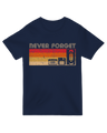 "Never Forget Video graphic t-shirt with distressed VHS tape design, worn by 90s enthusiast holding vintage camcorder"