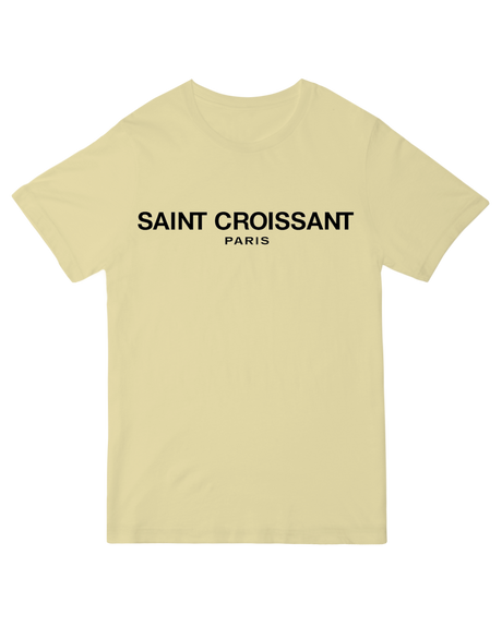 "Funny 'Saint Croissant' French bakery t-shirt in [color], pastry humor unisex cotton graphic tee"